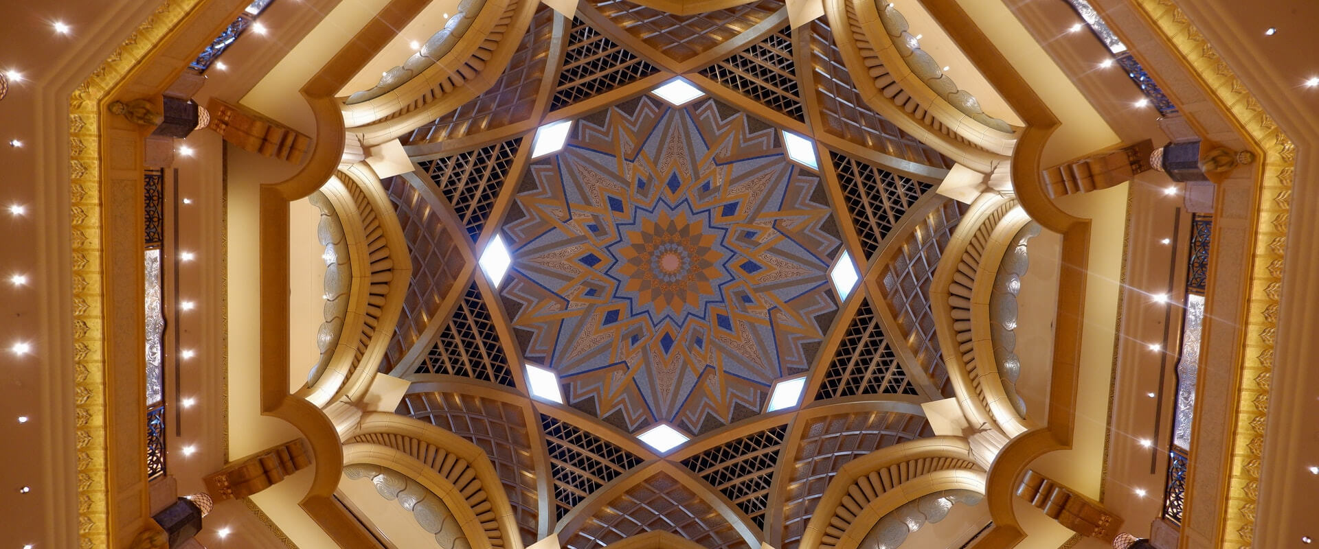 Gold geometric star dome ceiling
