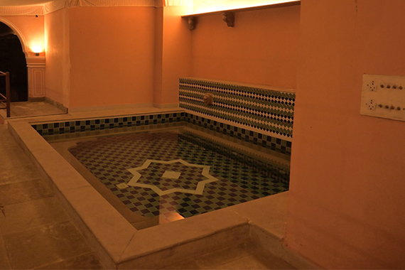 Padmaa pool — star-pattern tiled plunge pool with warm lighting